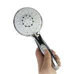 Safety shower head with stop button