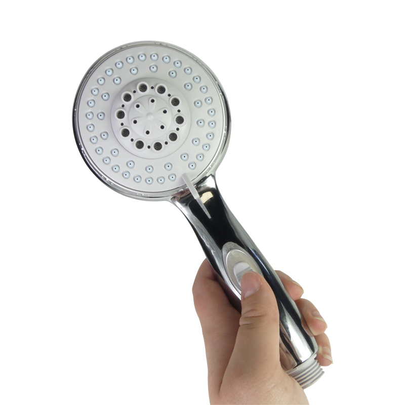 Safety shower head with stop button