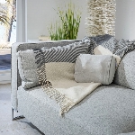 Coussin massage shiatsu, ambiance sur une canapé