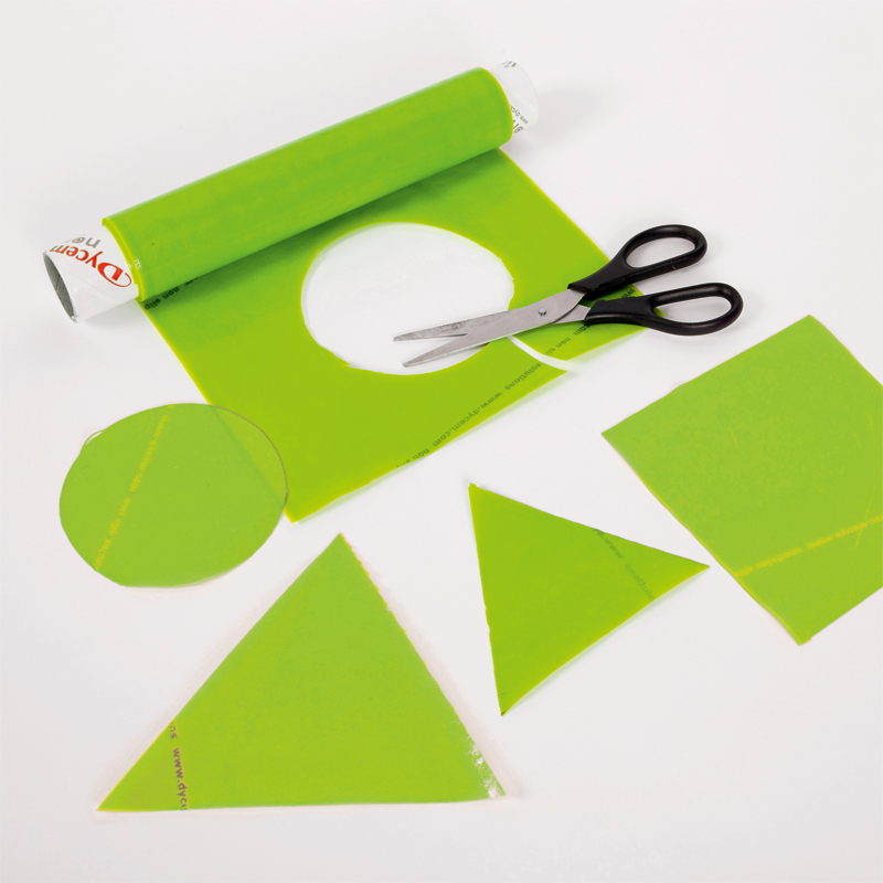 Antidérapant Dycem citron vert découpé en cercle, triangles et carré aux ciseaux