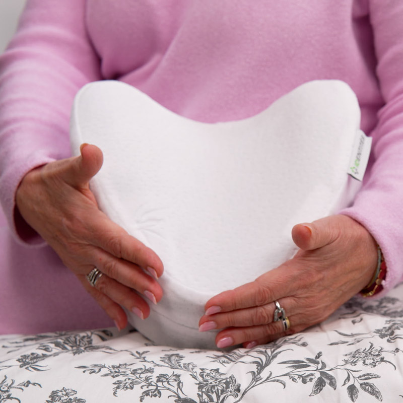 Coussin LEGLIFT VEGELYA en forme incurvée pour se positionner entre les jambes et les genoux
