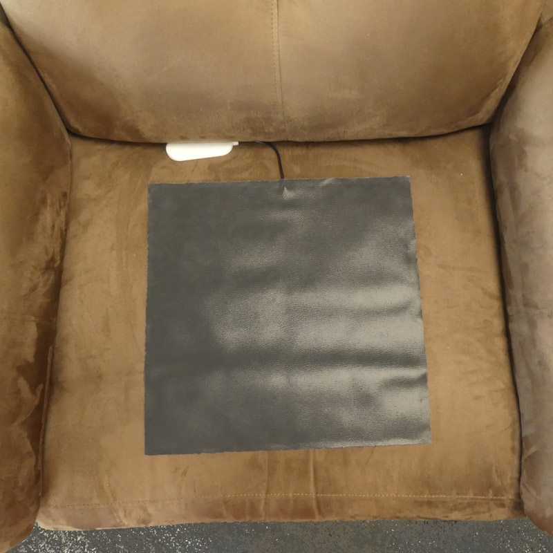 Tapis alarme absence sur un fauteuil