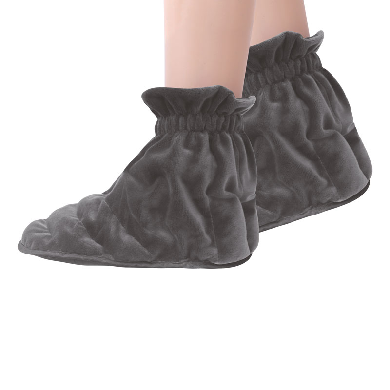 Paire de chaussons à chauffer en graines de lin porté